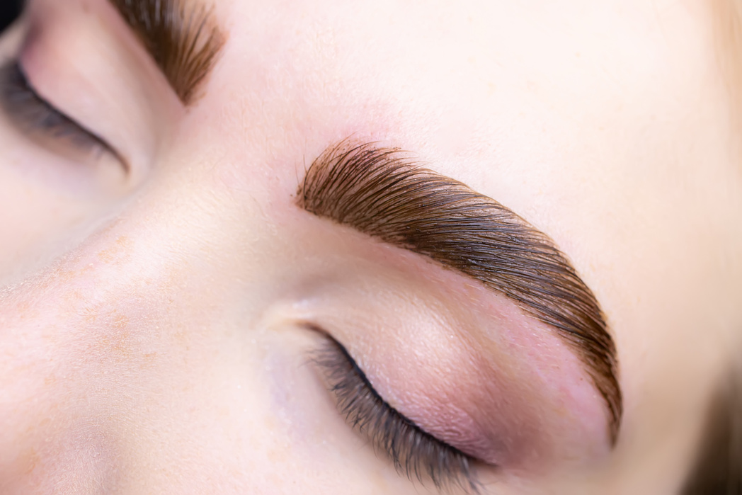 Close-up of Combed Eyebrows with Eyebrow Paint Applied to Them